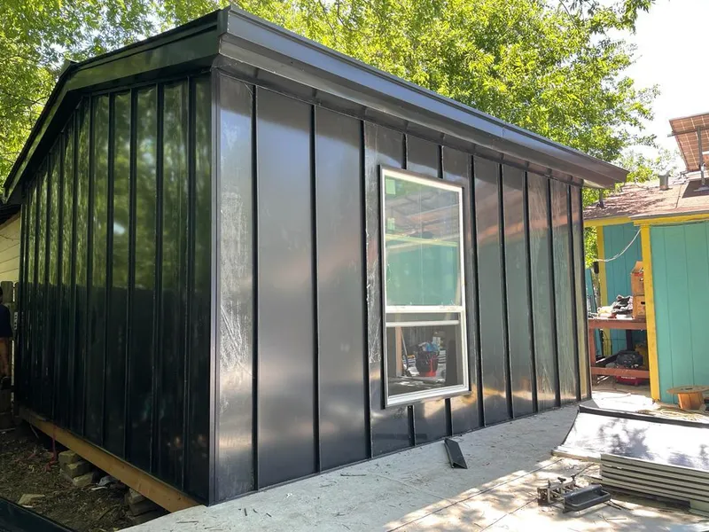 Black standing seam metal wall panels for Metal Roof Installation in Oakton